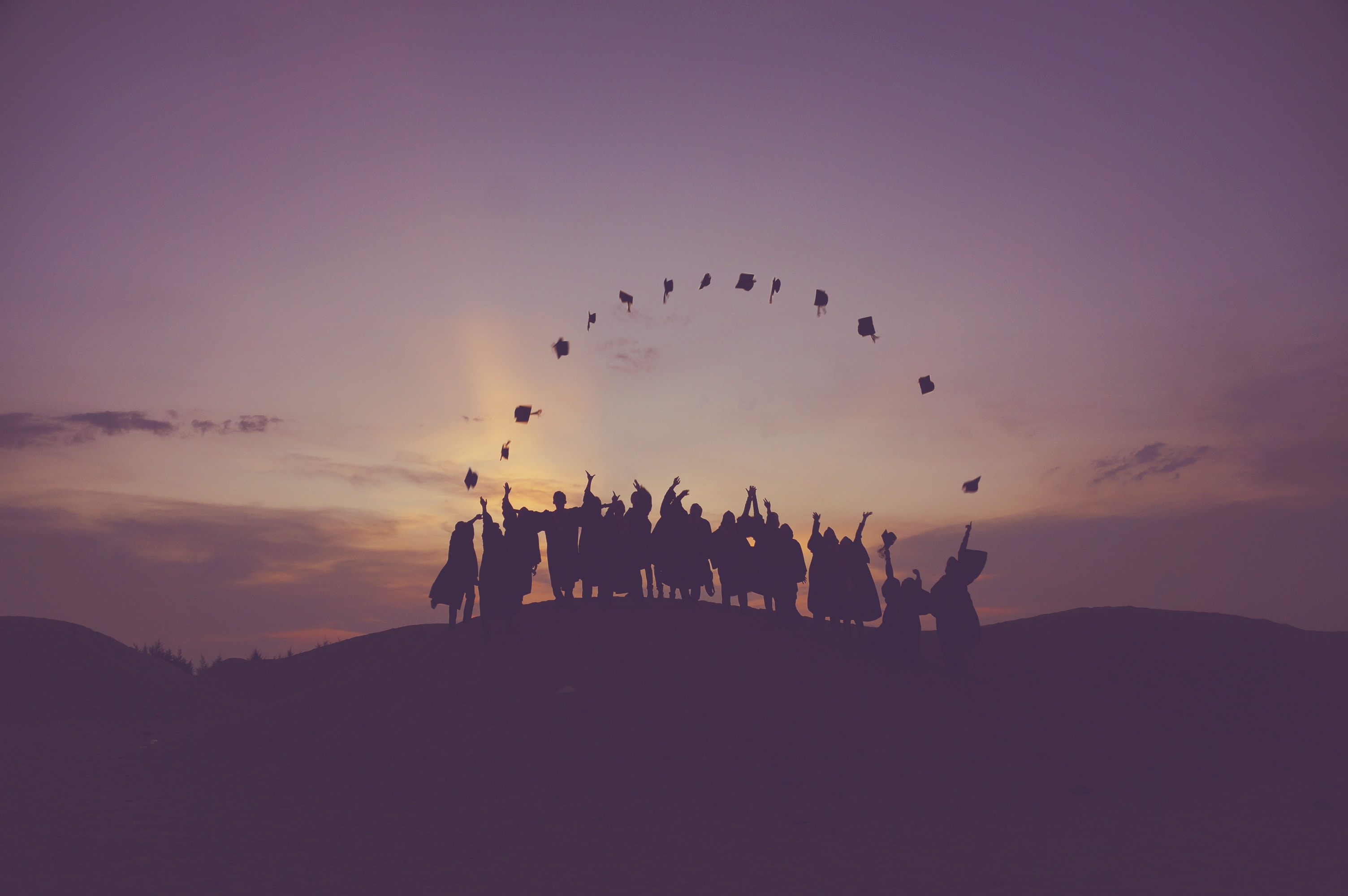 Students celebrating their graduation.