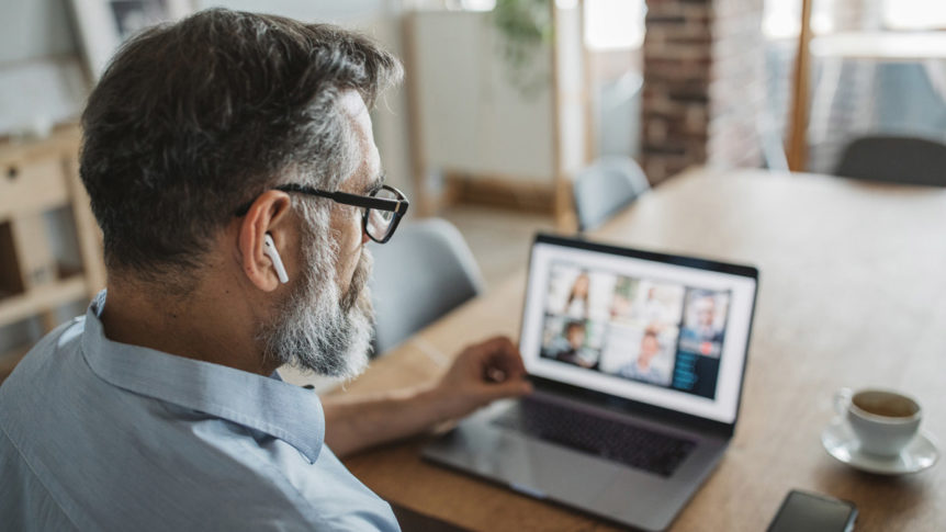 A person listening to an online meeting.